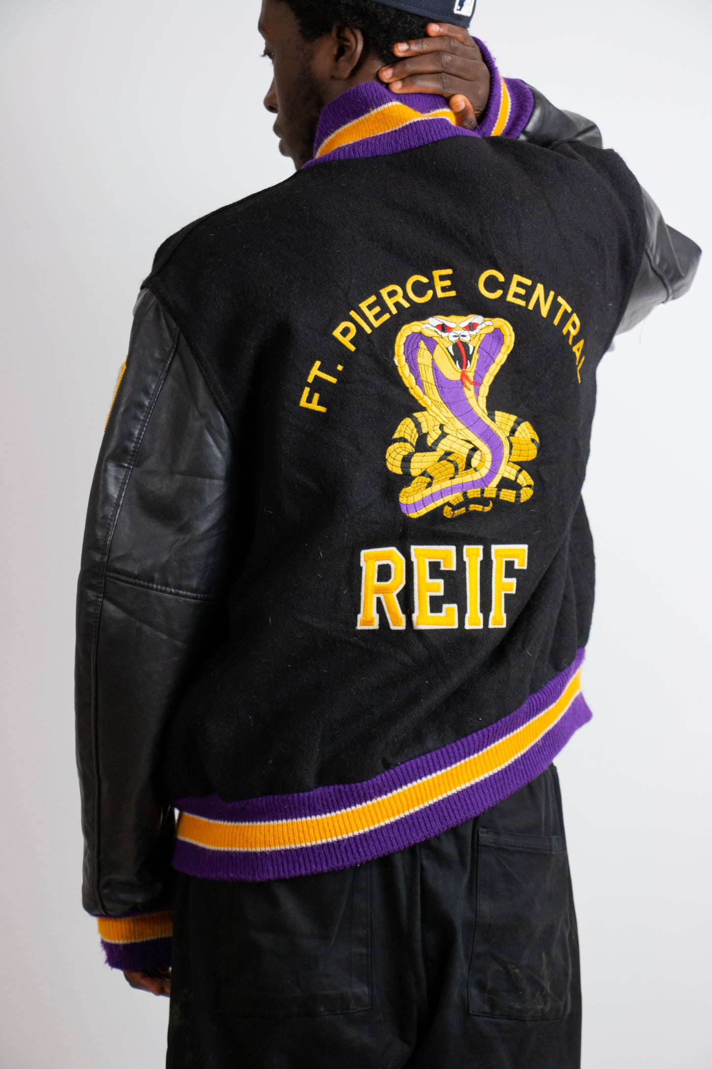 Varsity jas klassiek zwart-paars